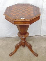 Victorian walnut octagonal trumpet work table with inlaid parquetry chess board lid opening to