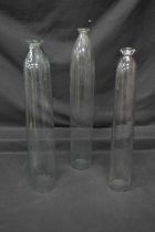 Three Victorian glass cucumber straighteners - 18.25", 19.75" and 19" long Please note