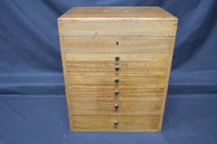 Mahogany flight of six drawers, the top opening to reveal sectional interior - 13" x 16" tall Please