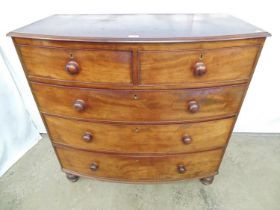 Victorian mahogany bow fronted chest of two short and three long graduated drawers with wooden