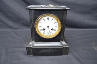 Black slate cased mantel clock with white enamel dial, Roman Numerals and black hands - 22.5cm