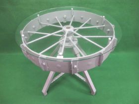 Bespoke circular glass top table utilising a vintage spade lug iron wheel (this can be removed