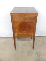 Mahogany washstand the two section top opening to four recesses over a single cupboard and drawer,