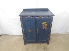 Pine and ply painted two door cupboard having a raised back over panelled doors and sides with