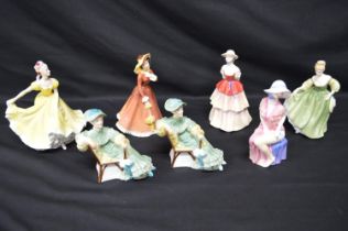 Group of seven Royal Doulton figures to comprise: two Ascot HN2356, Harriet HN3177, Eliza HA3179,