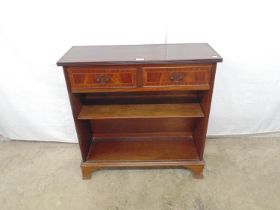 Reproduction inlaid mahogany bookcase having two small drawers over a single adjustable shelf,