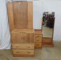 Waring & Gillows 20th century oak bedroom suite, all having carved decoration to the handles and