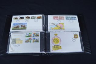 Album containing a quantity of First Day Covers dating from the 1980's Please note descriptions