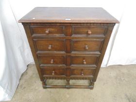 20th century oak chest of four short graduated drawers, standing on turned stretchered legs - 77cm x