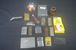 Group of vintage pocket and table lighters etc to include: Dunhill pocket lighter, cigar cutter