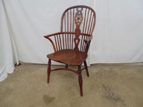 19th century yew wood and elm Windsor chair with stick back and pierced back splat, standing on