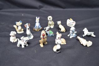 Group of fifteen Wade Whimsies Disney figures to include: two Siamese cats, Dumbo, Bambi & Jock