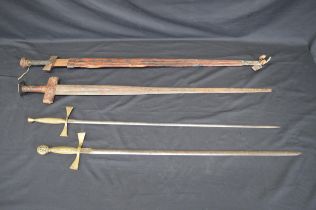 Group of four various brass and leather handled swords Please note descriptions are not condition