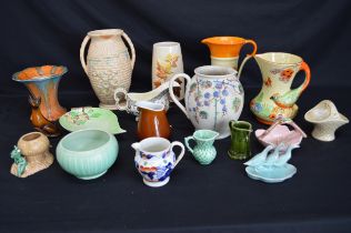 Collection of ceramics to include: Sylvac vase, Wadeheath jug and Lovatts Lagoon jug etc Please note