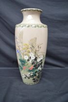 Large beige ground cloisonne vase having decoration of flowers and white metal mount to top and