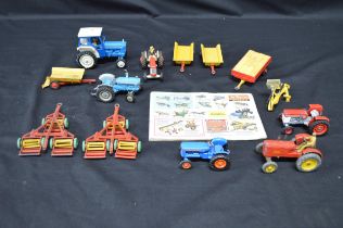 Tray of toy farming vehicles to include: two Meccano Ltd gang mowers, three Corgi trailers, one