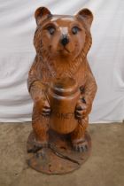 Dave Lucas carved figure of a bear, standing on hind legs and holding a Honey jar - approx 105cm