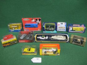 Eleven boxed vehicles from: Corgi, Dinky, Matchbox, Brumm, Burago, Maisto and a Marks & Spencer