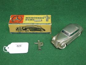 A Prameta (W. Germany) all metal clockwork Mercedes Benz 300 with steering, forwards & reverse and