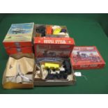 Three tinplate helicopters having hand powered flight possibilities with instructions from Arnold (W