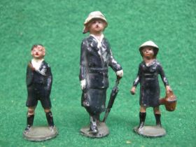 Three possibly J Hill & Co. cast metal figures of a 1930's Governess with school boy and girl - 1.