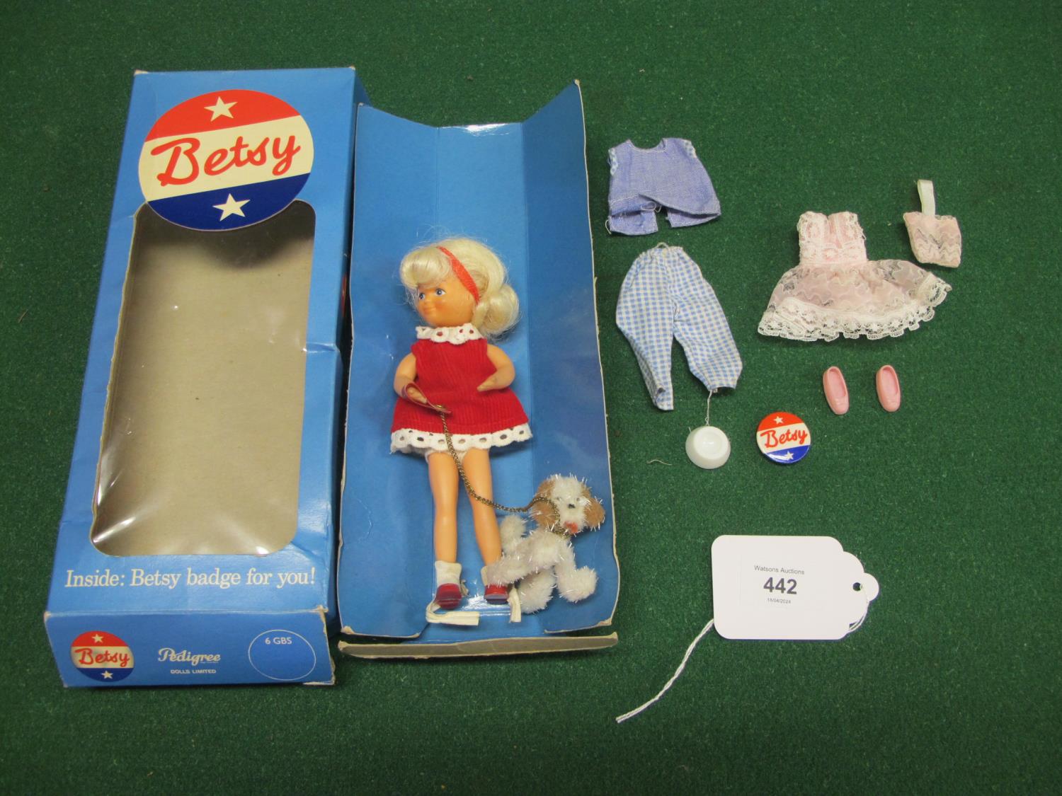 Rare boxed Pedigree Dolls Ltd Betsy with blonde hair and wearing a sleeveless red cord dress trimmed