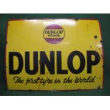 Pre-war enamel sign for Dunlop - The First Tyre In The World, black and red on a yellow ground
