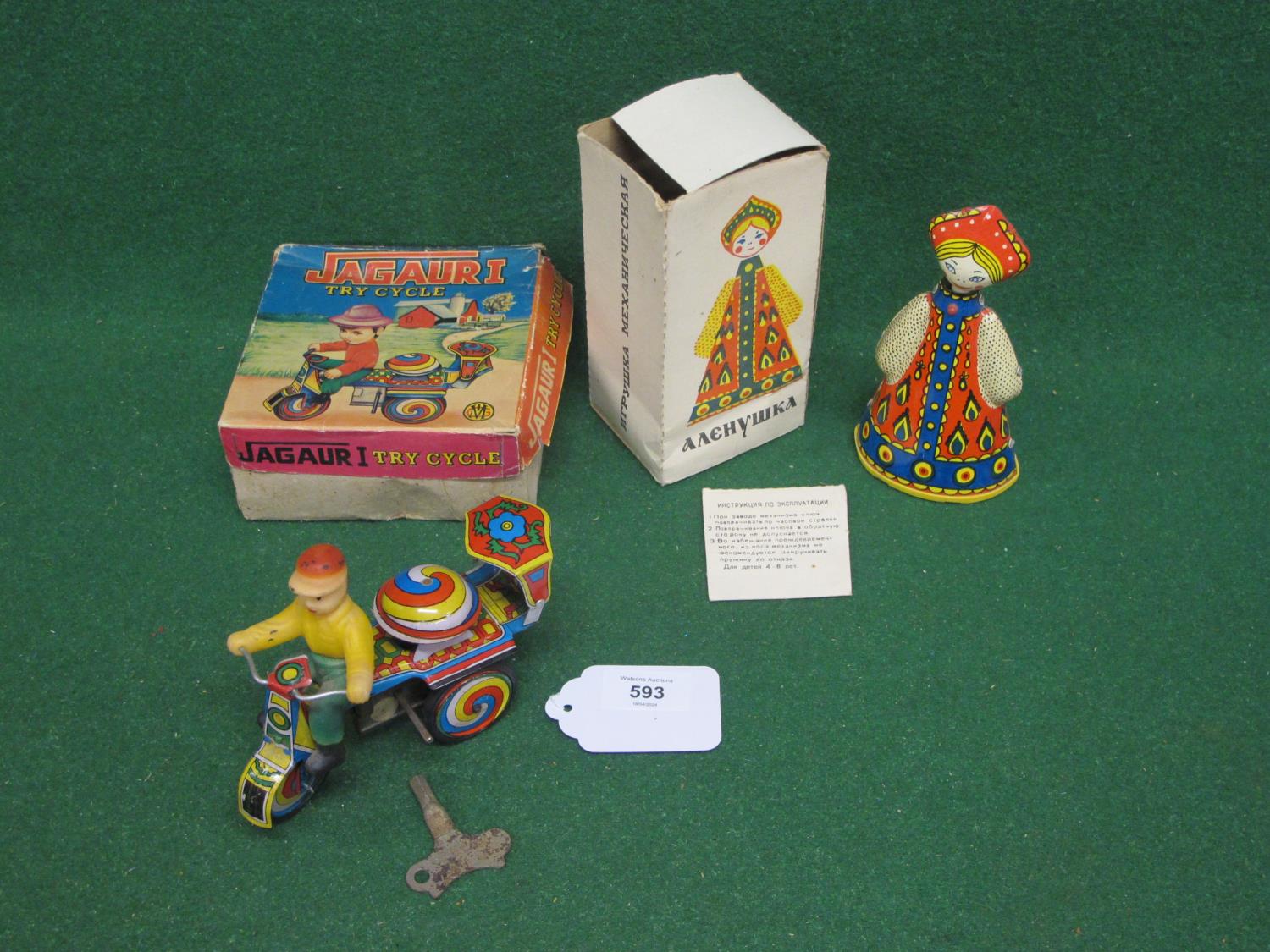 Two tinplate and plastic clockwork toys to comprise: a Jaguar I by MIG tricycle with key, rider, - Image 2 of 2