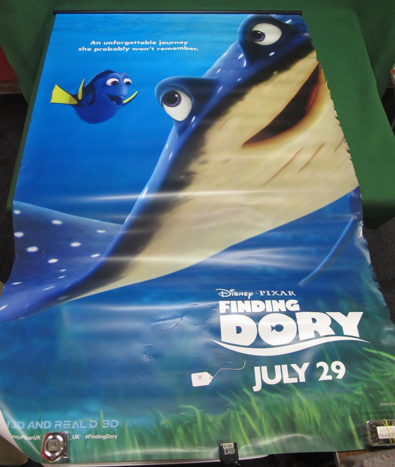 Movie banner for Disney-Pixar's Finding Dory - 60" x approx 94" together with an unopened movie