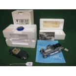 Two Franklin Mint metal and plastic models of a 1961 Jaguar E Type and a 1907 Rolls Royce Silver