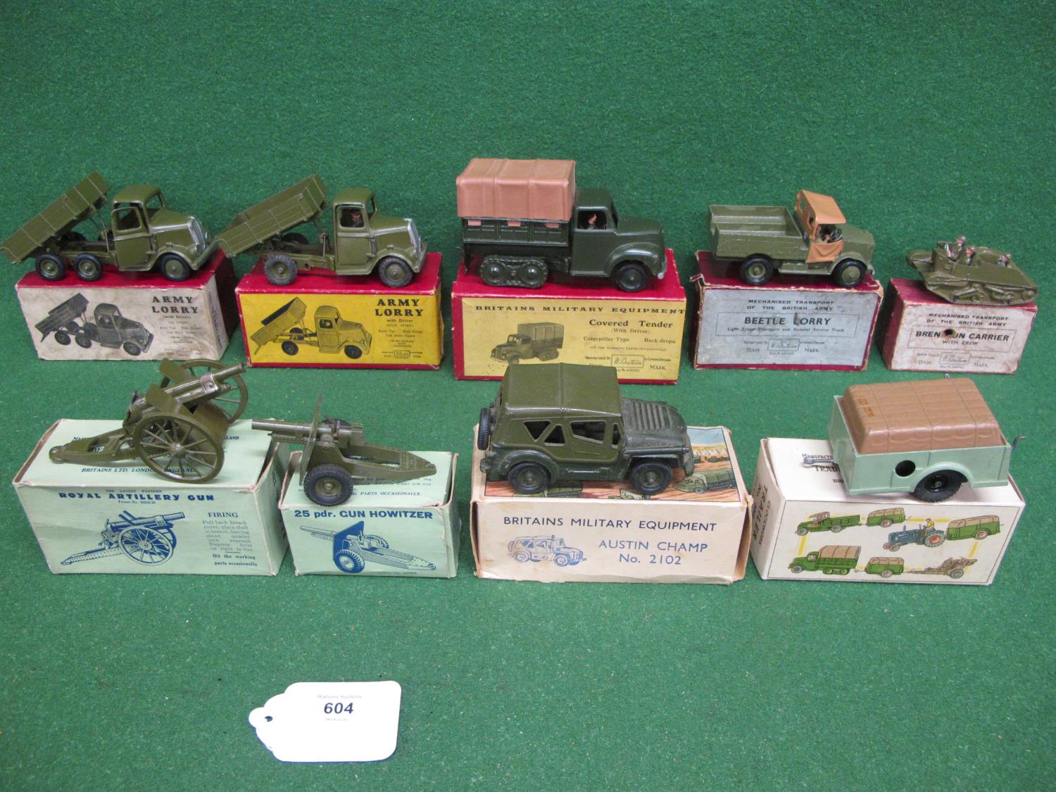 Nine boxed Britains military vehicles and guns to comprise: 1201 Royal Artillery gun, 1334 Four