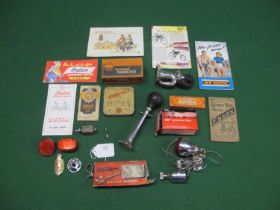 Quantity of cycling ephemera, bicycle parts, lights etc to include: an early 20th century Bacon's
