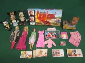 Mixed lot to include: three dolls with clothes and accessories, ten Barbie catalogues, three Micky/