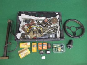 Mixed crate containing: SU electric petrol pump, steering wheel, bulbs, grease guns, amp meter (