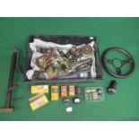 Mixed crate containing: SU electric petrol pump, steering wheel, bulbs, grease guns, amp meter (