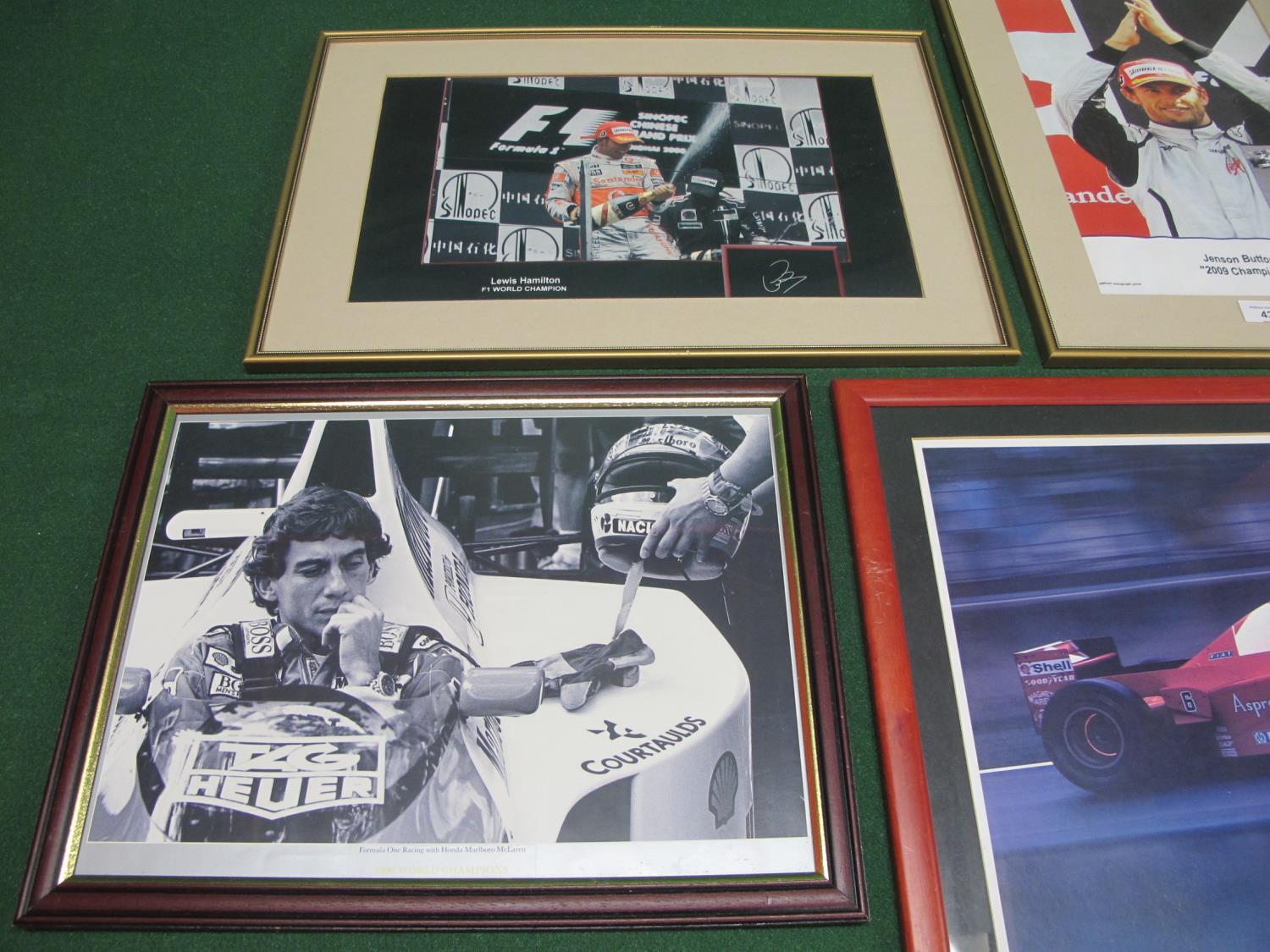 Four motor racing prints to comprise: Lewis Hamilton, Ayrton Senna, Jenson Button (signed) and an F1 - Image 2 of 3