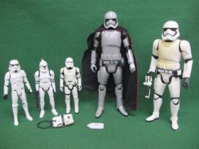 Five different plastic Storm Troopers by Jakks, Santa Monica, USA and Hasbro - heights from 11.5" to