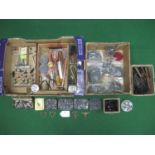 Two boxes of O gauge track laying parts and tools to include: large quantity of cast and sprung