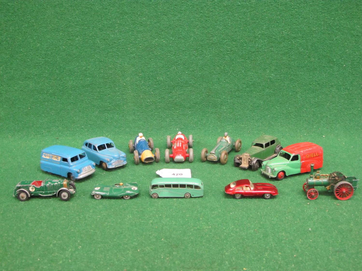 Twelve loose playworn Dinky and Lesney vehicles to include: 470 Shell-BP van, 481 Ovaltine van, - Image 2 of 3