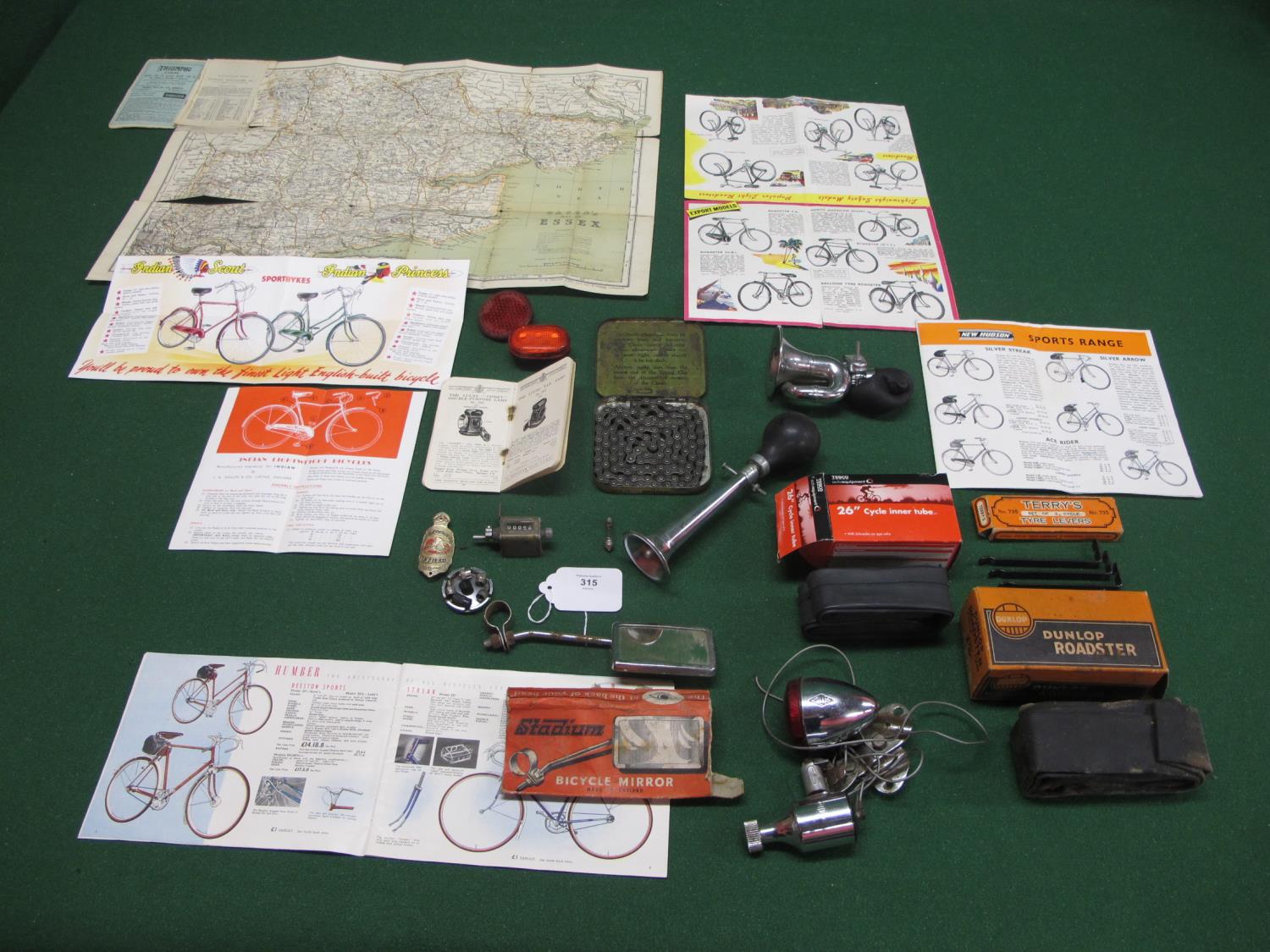 Quantity of cycling ephemera, bicycle parts, lights etc to include: an early 20th century Bacon's - Image 2 of 2