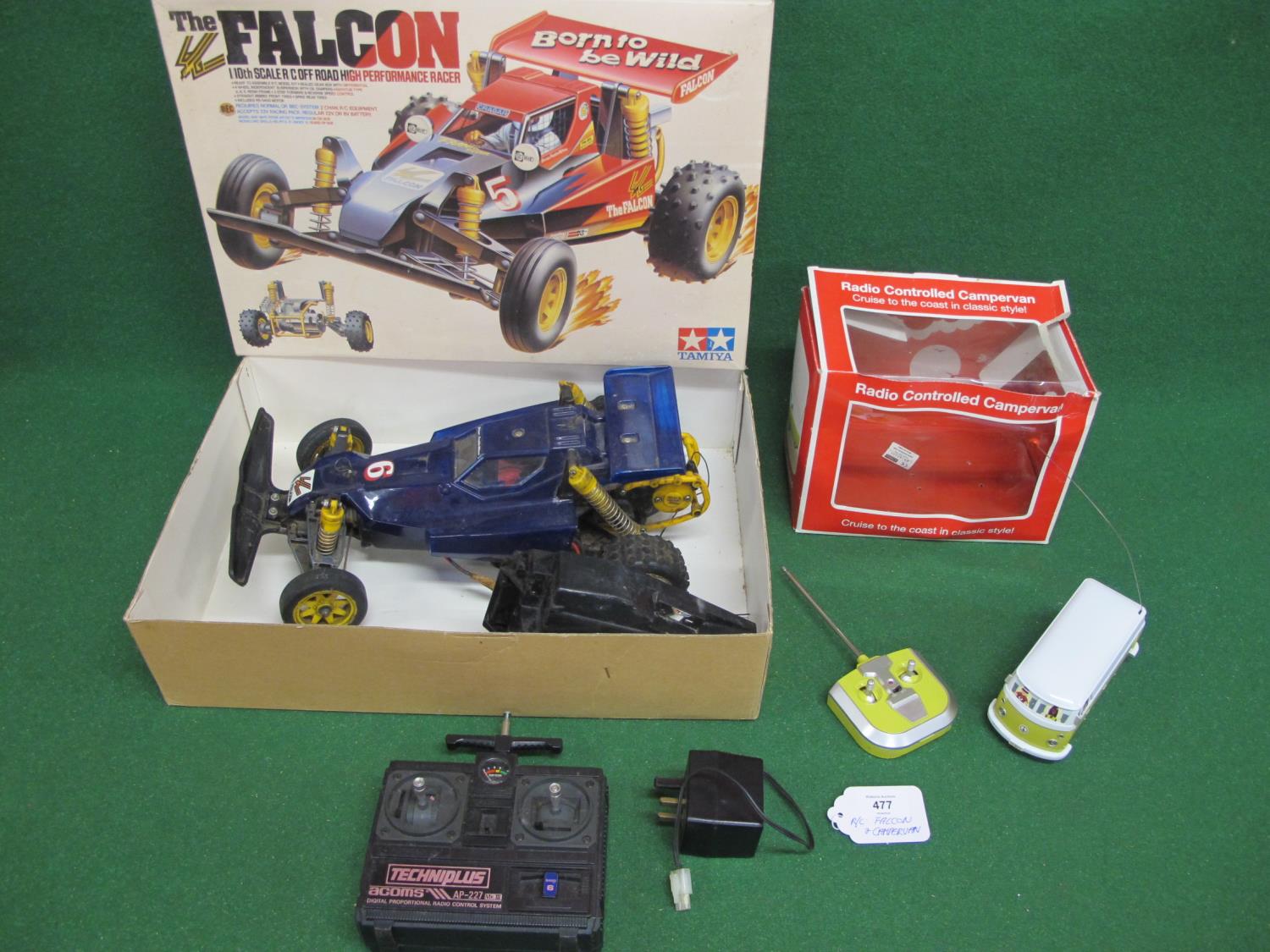 Two radio controlled vehicles with their boxes to comprise: Tamiya 1:10 scale off road racer The