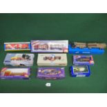 Nine boxed commercial vehicle models from Siku, Corgi, Tematoys and Conrad (Volvo lumber lorry