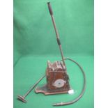 An Entirely British Baby Daisy Model No. 1 vacuum cleaner of wood, metal and leather construction