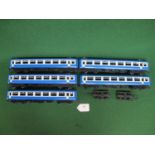 Five Triang Big-Big plastic O gauge Bogie coaches with roof operated opening doors in blue and white