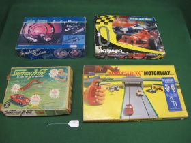 Four different slot type car sets to comprise: Matchbox Motorway No. 12 with four vehicles and