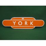 Reproduction enamel BR(E) orange totem for York, situated on the former North Eastern Railway