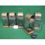 Five square brass lanterns with bevelled glass, paraffin burners and top handles, stamped GWR on