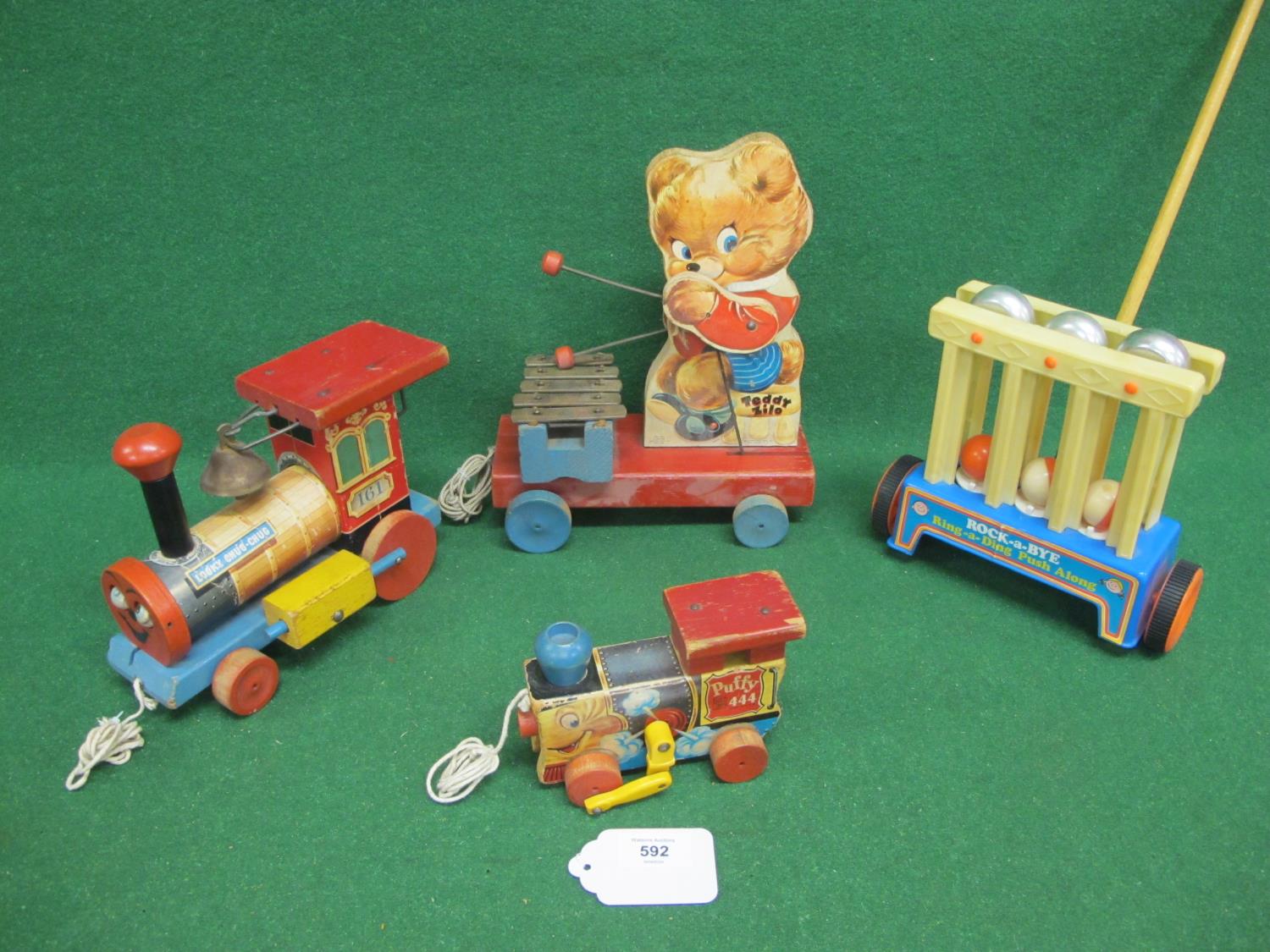 Three wooden Fisher-Price USA pull-a-long toys to comprise: Looky Chug-Chug with noise and bell,