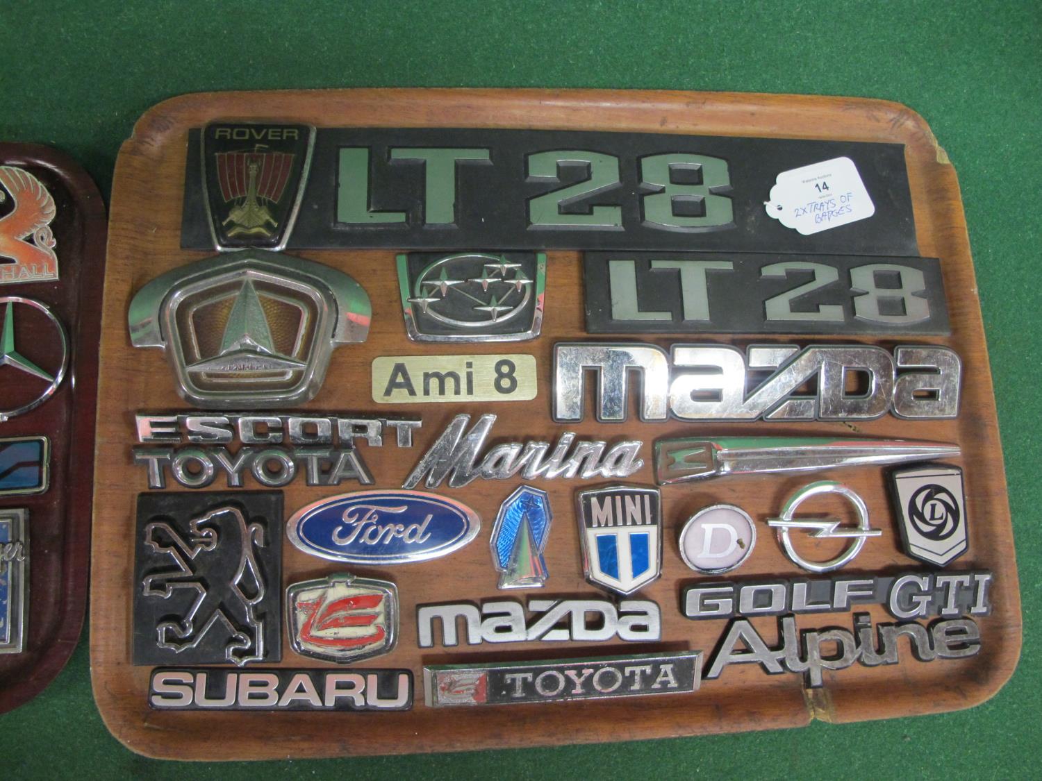 Two trays of metal and plastic vehicle manufacturers badges to include: Ford, Avenger, Golf GTI, - Image 2 of 3