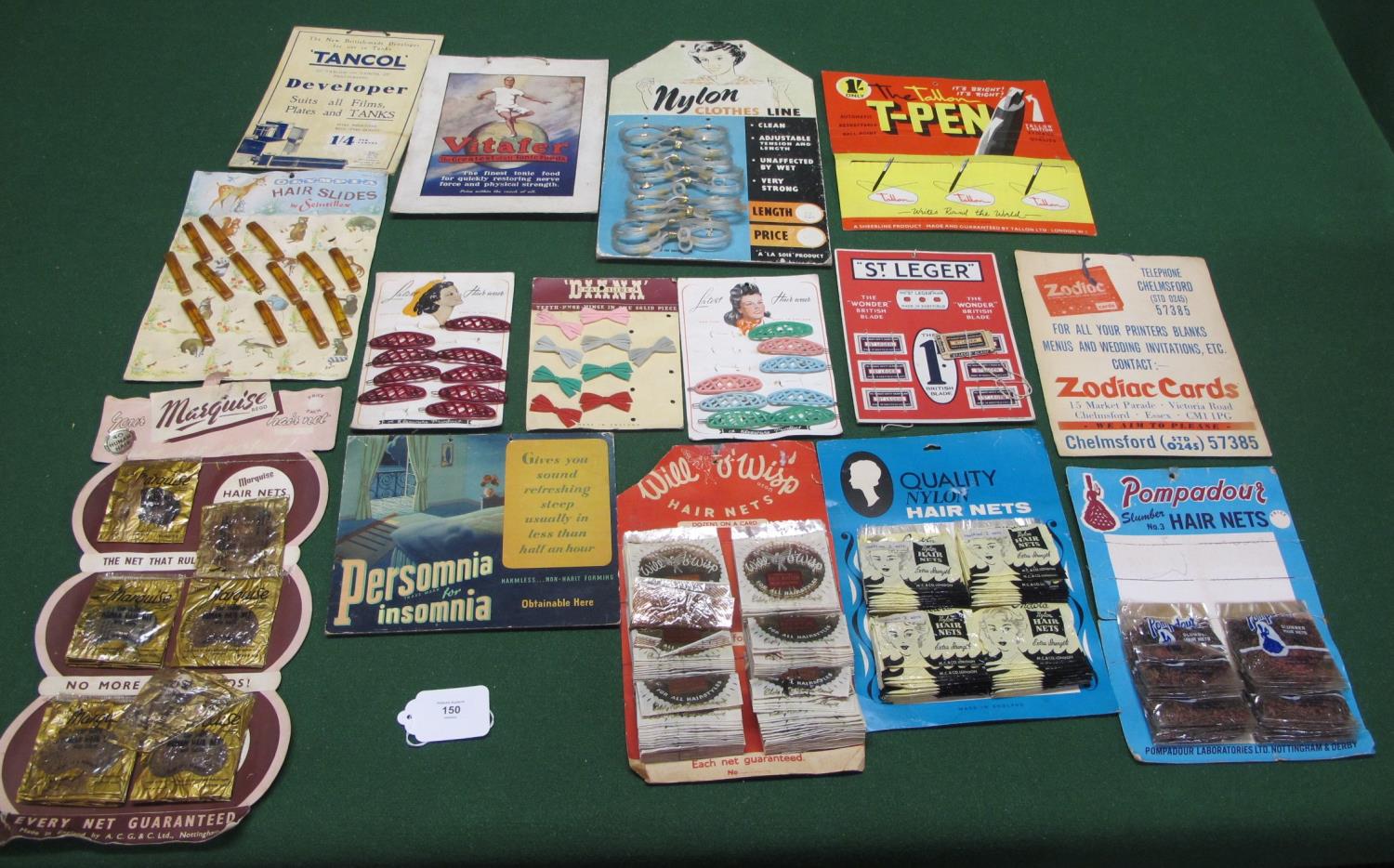 Fifteen shop advertising and product hanging cards, some still retaining some items, all produced in